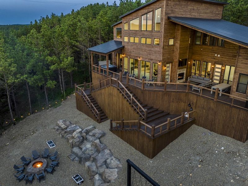 Rear view of cabin amongst the trees