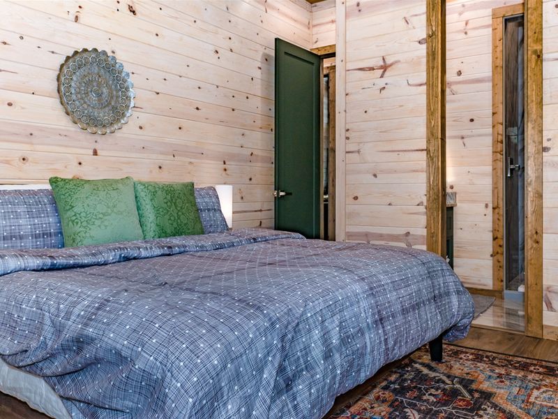 Layers of warmth and a whole lot of charm. Bedroom 1
