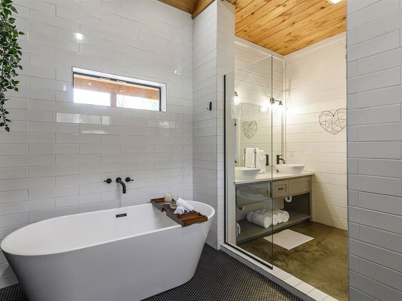 Luxuriate in the spaciousness of our double shower and soaking bathtub, where you can unwind and rejuvenate after a day of adventure.
