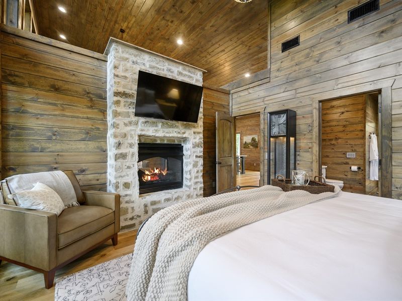 Double-sided stone fireplace