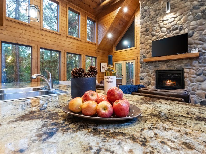 The open-concept floor plan means the chef is never away from the conversation.