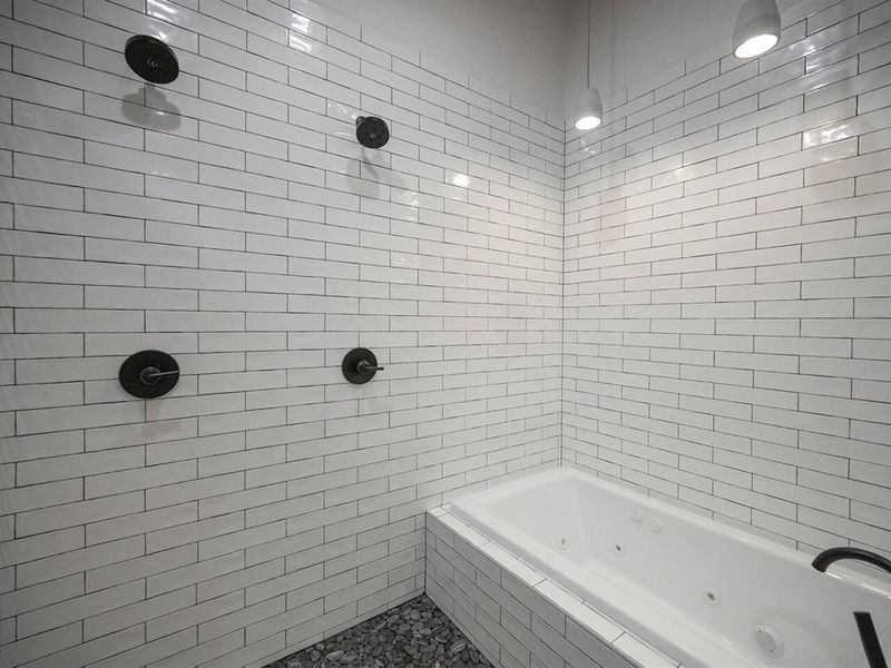 Jetted tub with dimmable lighting overhead