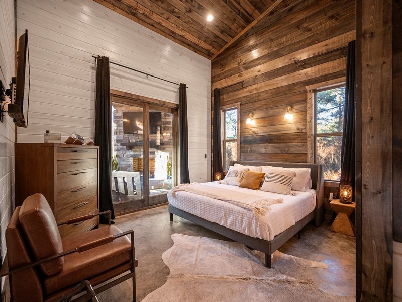 Bedroom 2 features a luxurious king bed for a restful night’s sleep.