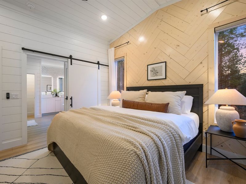 Wake up to natural light and the calming beauty of the surrounding woods.