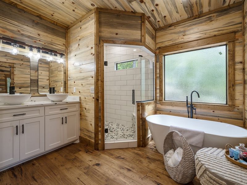 "Luxury nestled in nature — our second master suite is a harmonious haven of peace."