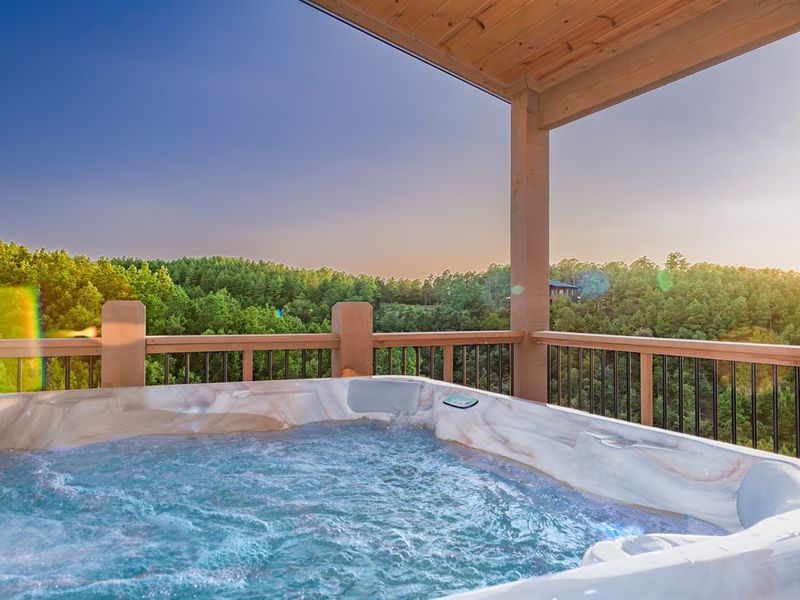 Experience tranquil hot tub high above forest