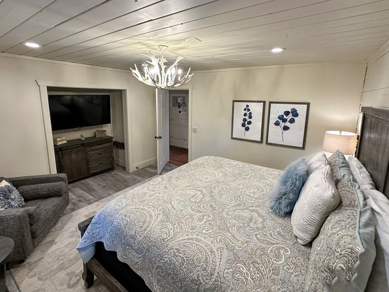 Unwind in style with our luxurious king bed and Smart TV.