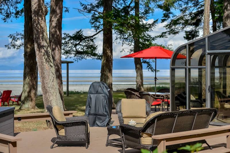 Enjoy the outdoor living with beach front access.