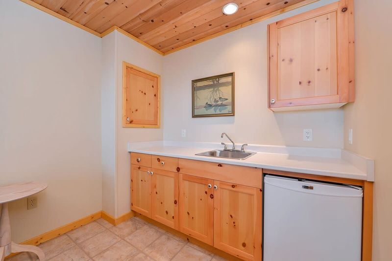 Cabin acts as fourth bedroom and third bathroom. 