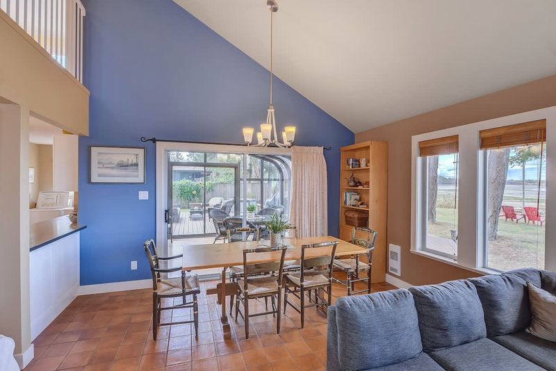 Dining space with views of beach. 