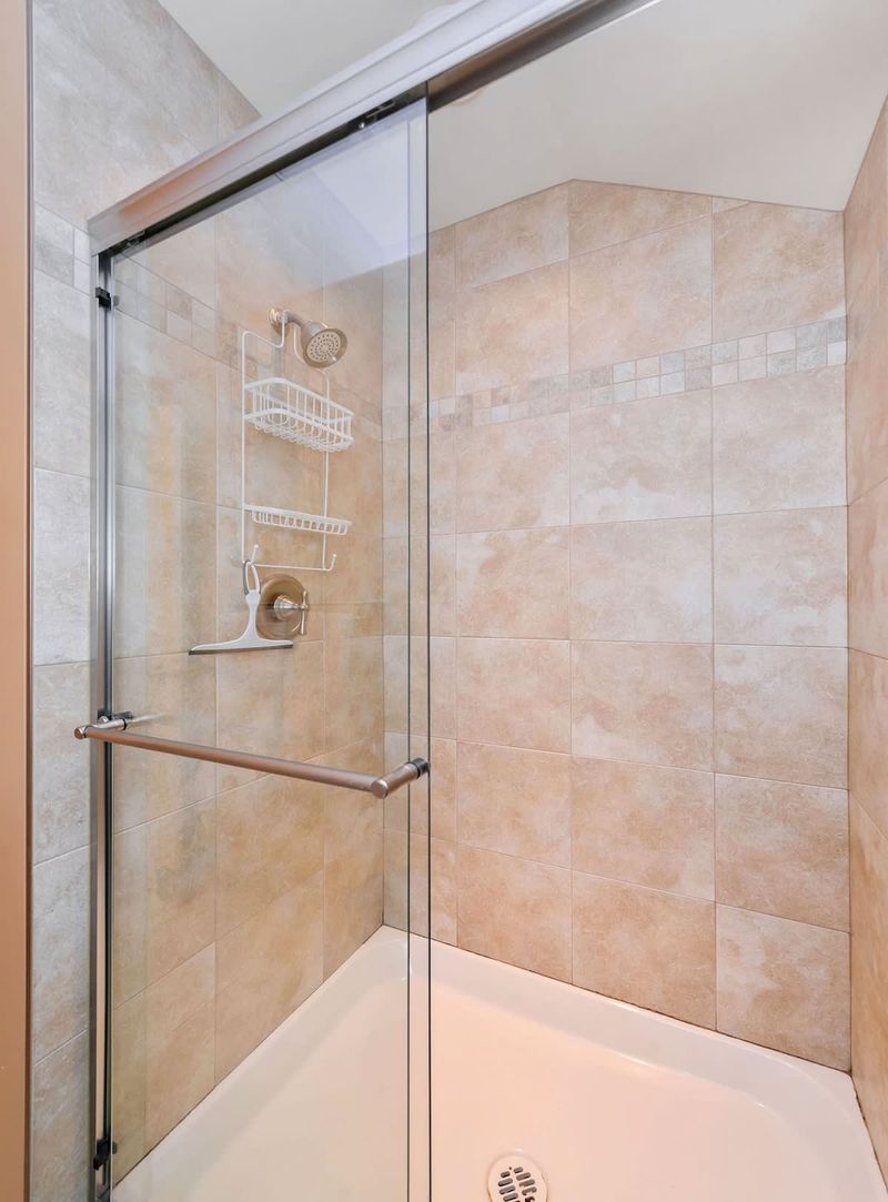 Second floor level bathroom with walk in shower. 