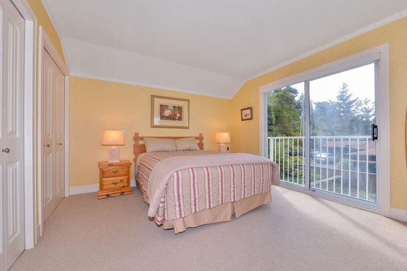 Master bedroom with step out balcony on second floor. 