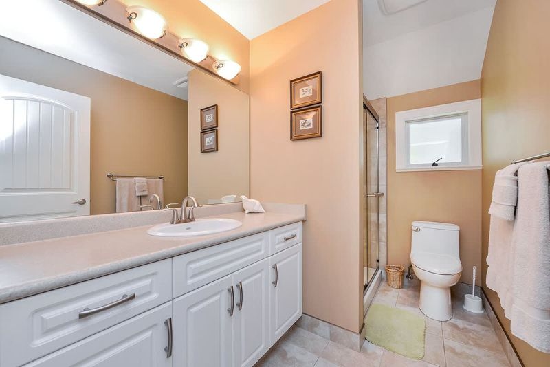 Second floor level bathroom with walk in shower. 