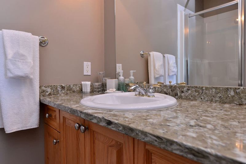 The four piece bathroom is shared by both the third and fourth bedroom. It can also be accessed by the hallway. 