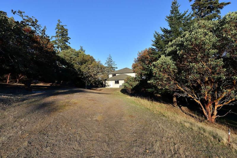 The house is located on an acreage offering many places to explore.