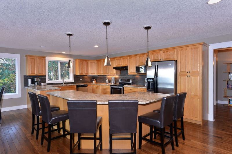 The kitchen island seats six comfortably.