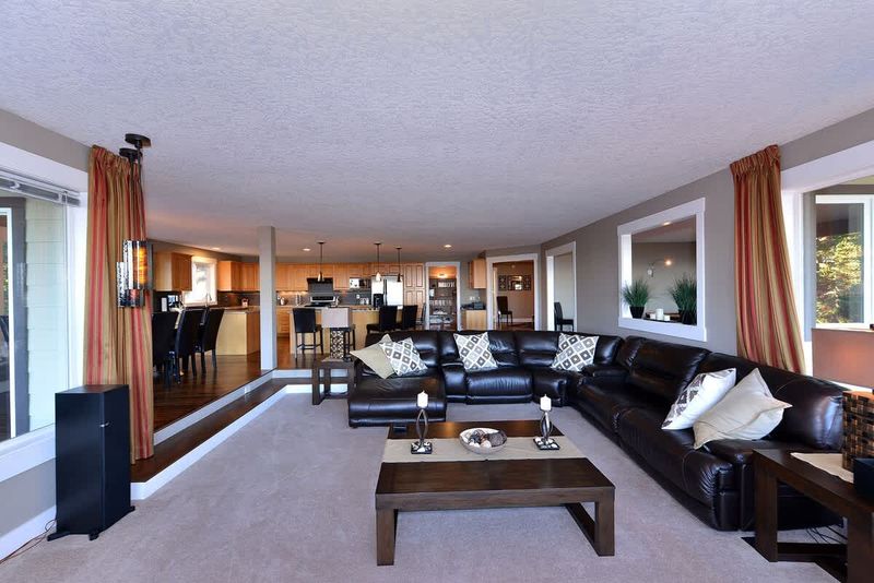 The formal living room with large sectional couch.