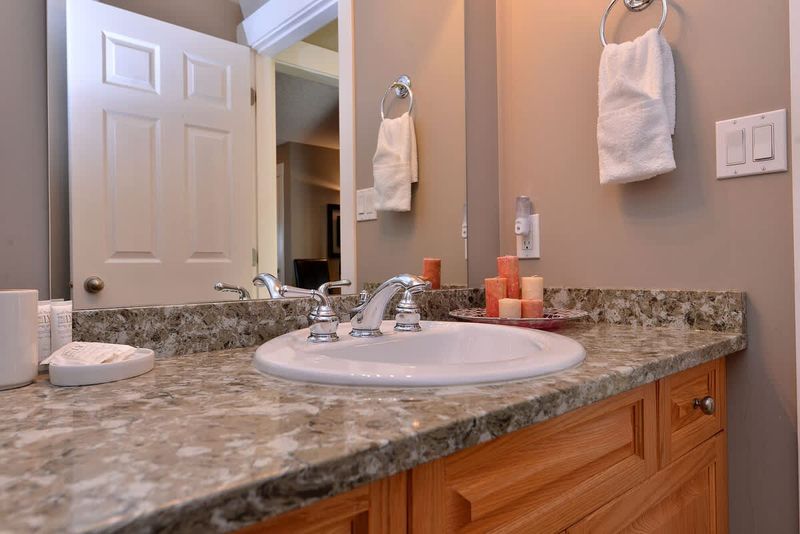 Two piece bathroom located on the main level of the home.