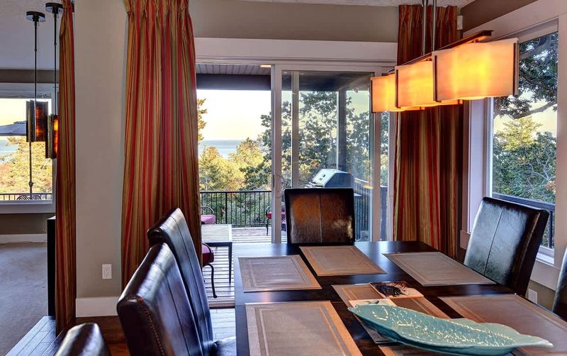 The formal dining area has seating for eight. An additional leaf and chairs are available to extend the table to provide seating for ten. 