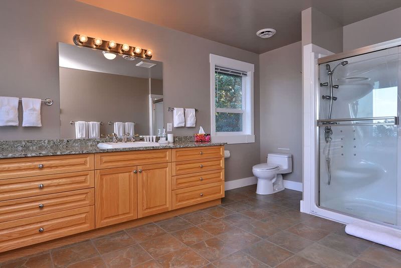 Master bedroom ensuite with walk in shower and soaker tub. 
