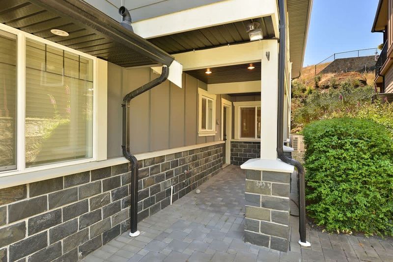 Main level suite entrance to right of house. 