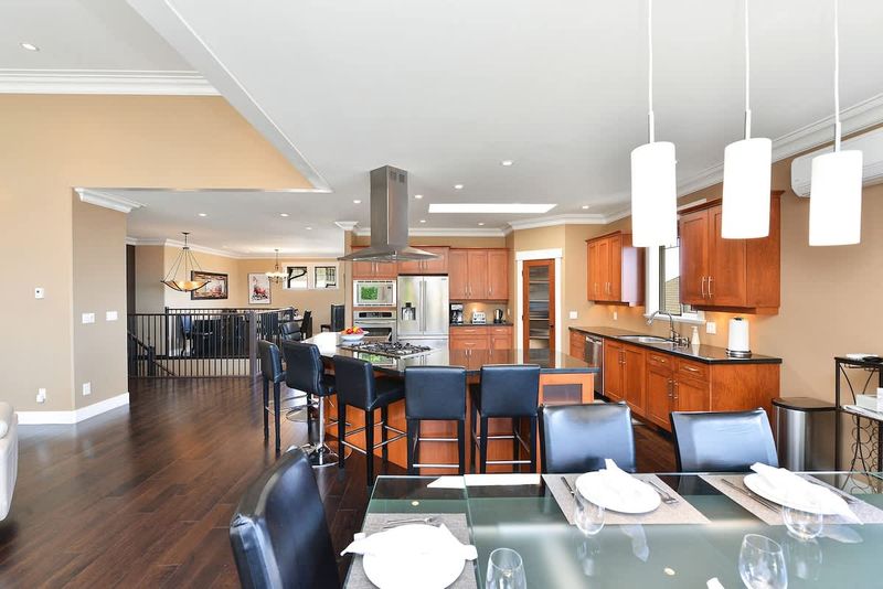 Upper Main level kitchen and dining space. 