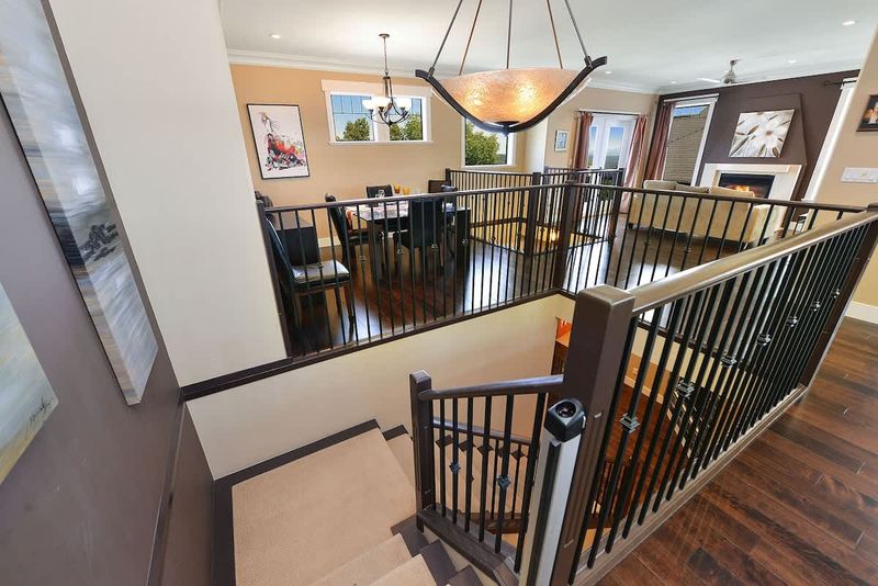 Main level staircase to the upper main level. 