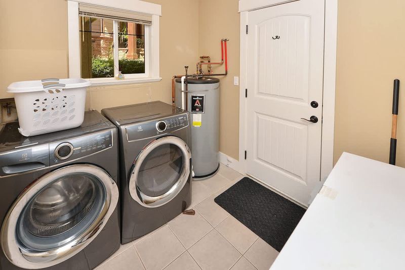 Main level laundry room. 