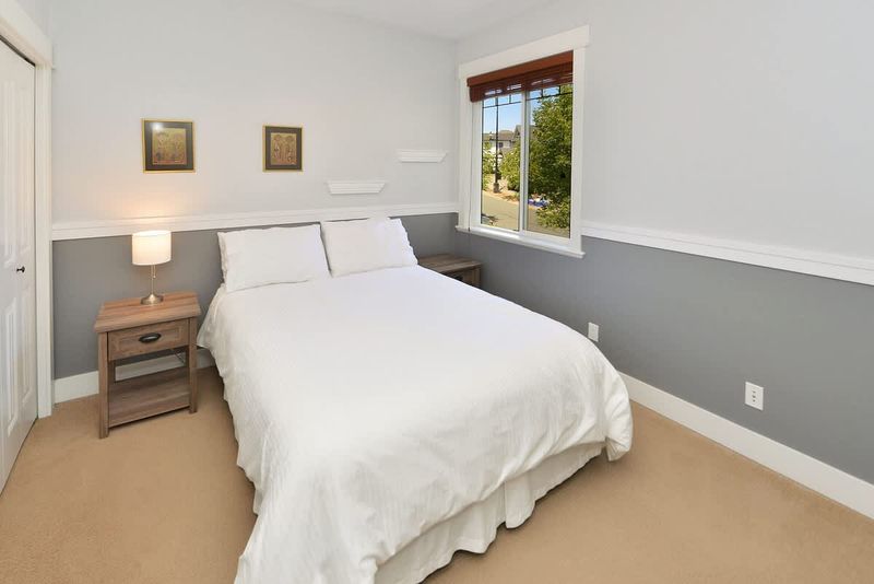 Upper Main Floor 2nd Queen Bedroom. 