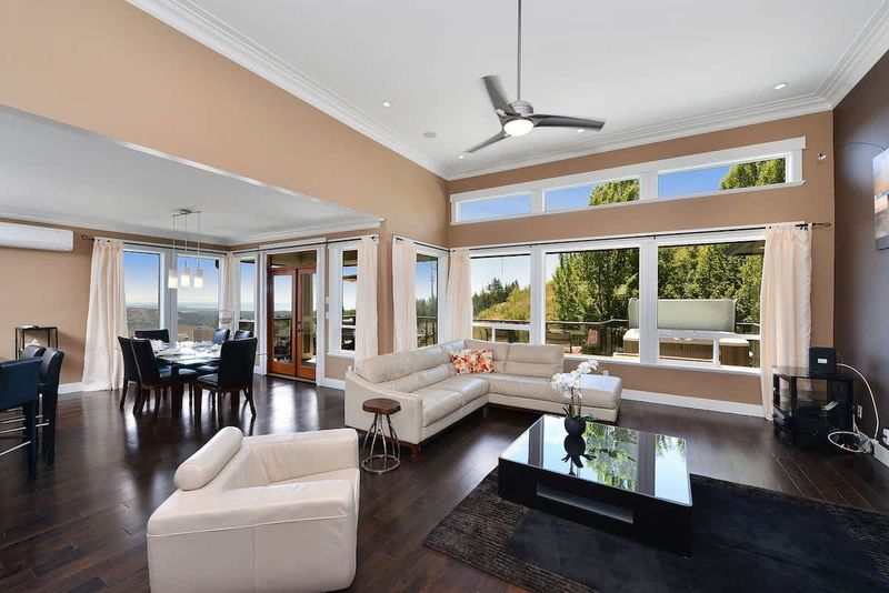 Upper main level living, kitchen, and dining space. 