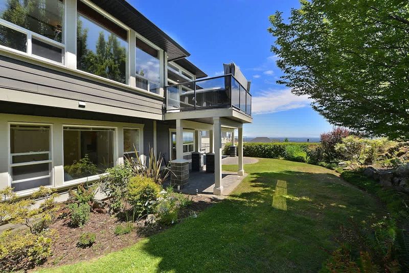 Back of house and yard plus views. 