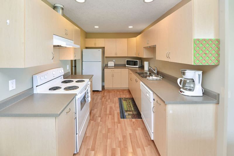 Main level full second kitchen. 