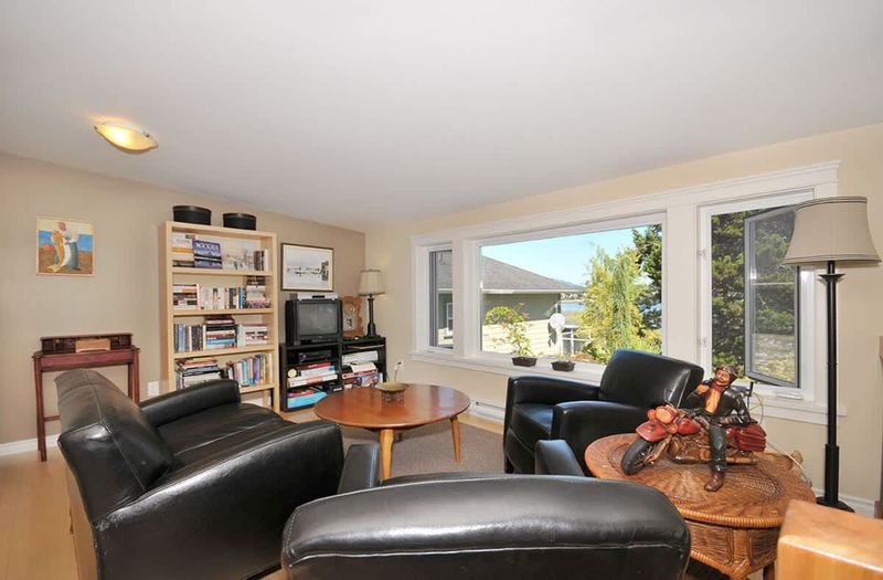 Sitting area at the loft bedroom with stunning ocean and garden views.  