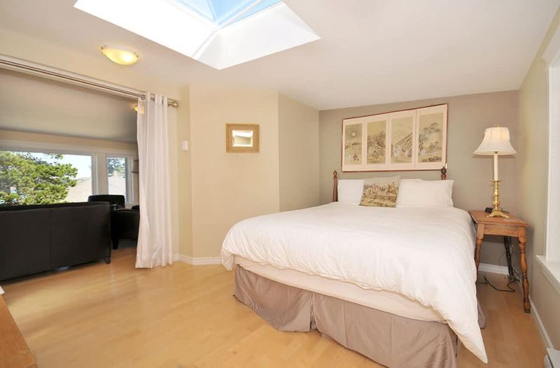 A spacious loft with queen sized bed. 