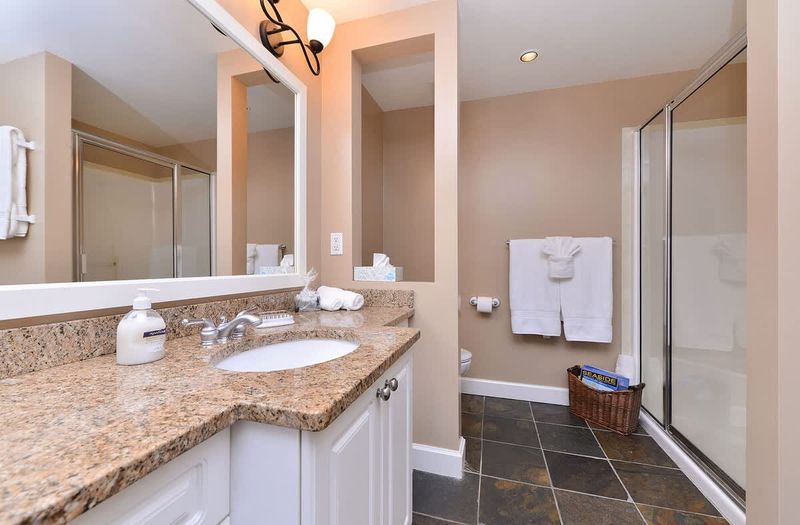 Large and spacious Master bathroom with walk in shower and soaker tub. 