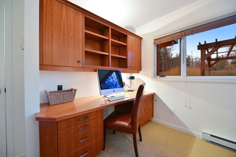 Third bedroom with queen bed and work space.