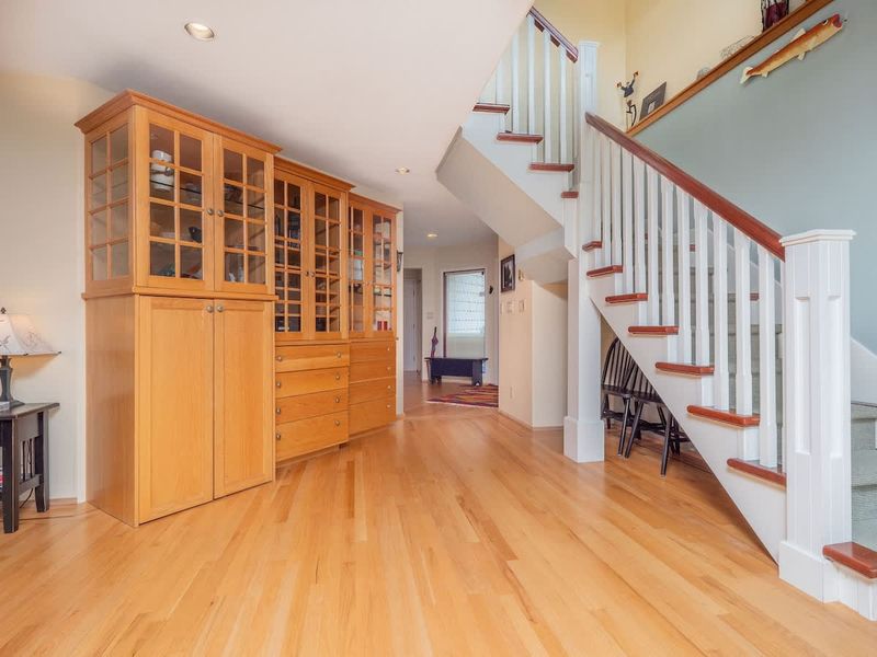 Main entrance and stairs to primary bedroom. 
