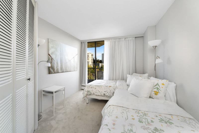 Second bedroom with two twin beds.