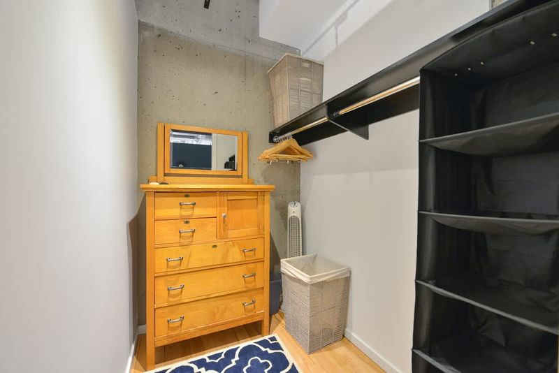 Primary bedroom walk in closet.