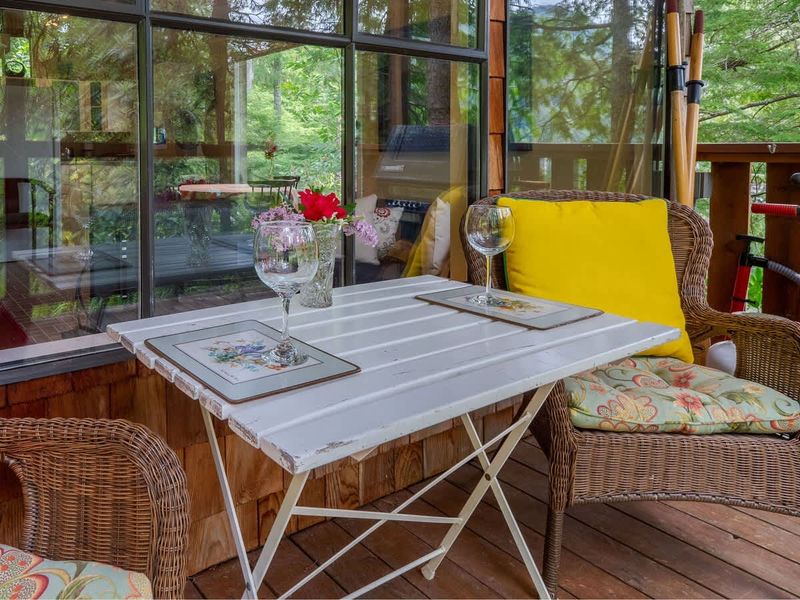 Outdoor patio space with BBQ grill. 