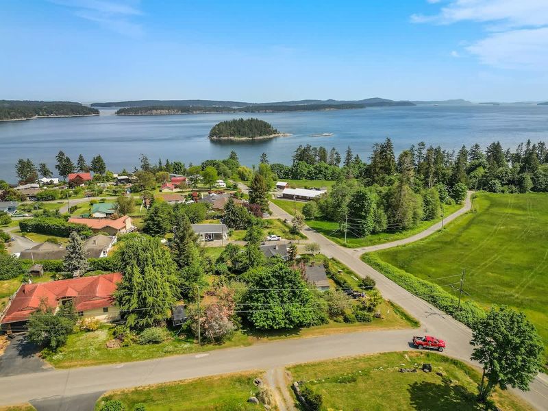 Drone aerial photo above the cottage facing the ocean.