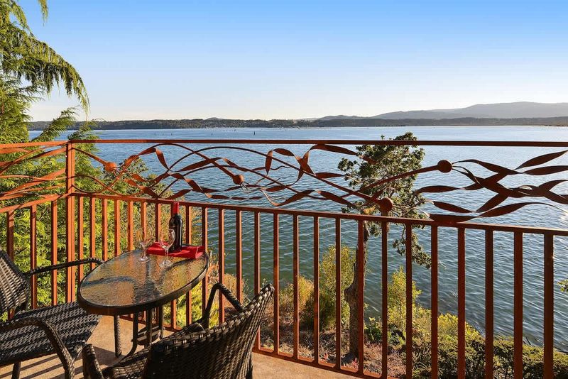 Private balcony with bistro set to enjoy the bayside experience.