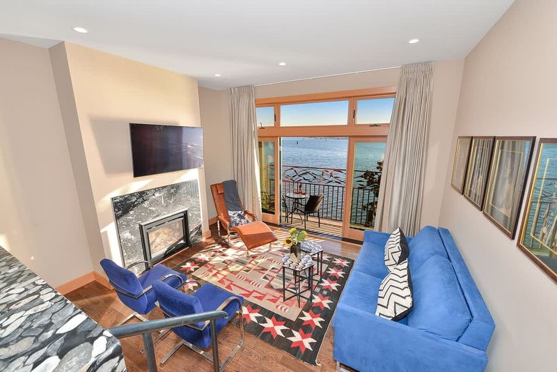 Well appointed living room with amazing bay views.