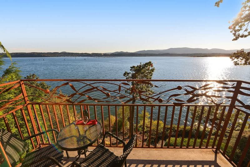 Private balcony with bistro set to enjoy the bayside experience.