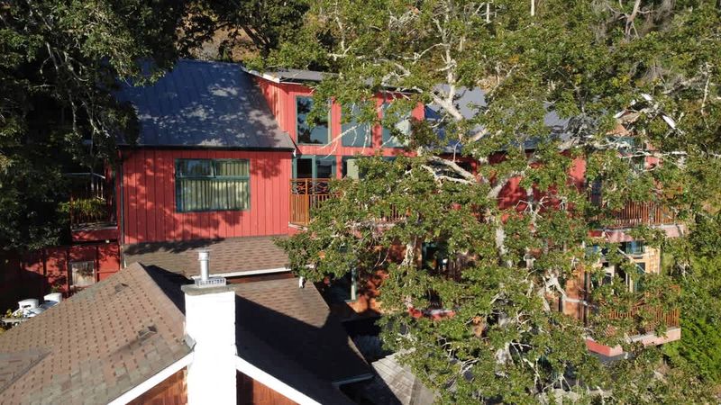 Flyover view of the tree house suites property.