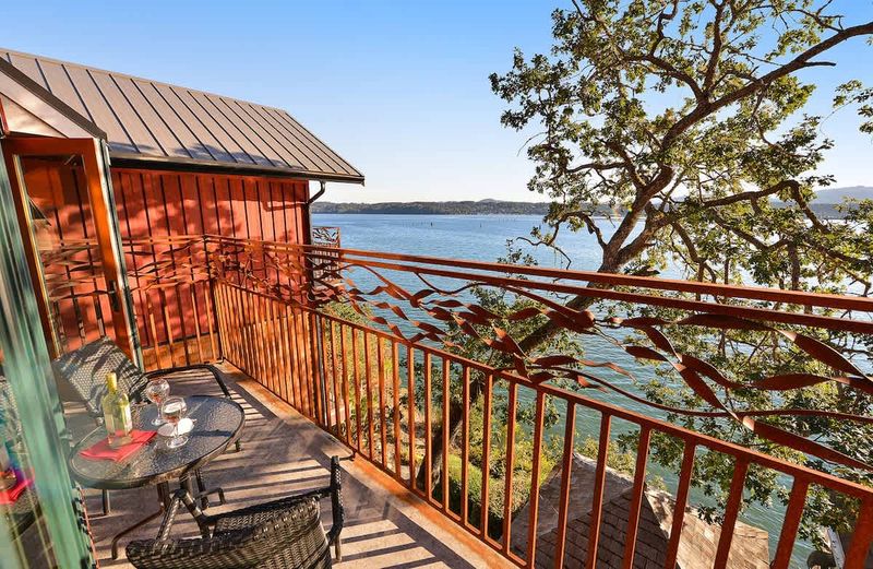 Main balcony with sweeping Bay Views and ornate kelp rails.