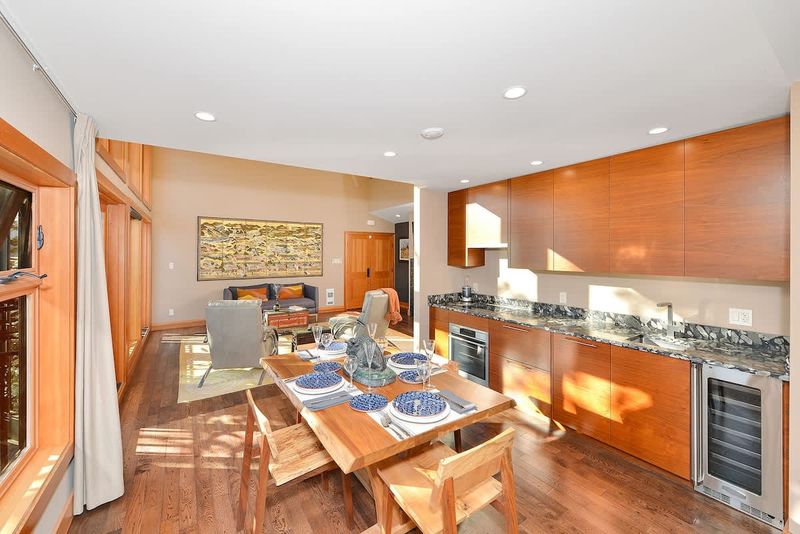 Open plan with dining room, kitchen, and living room.