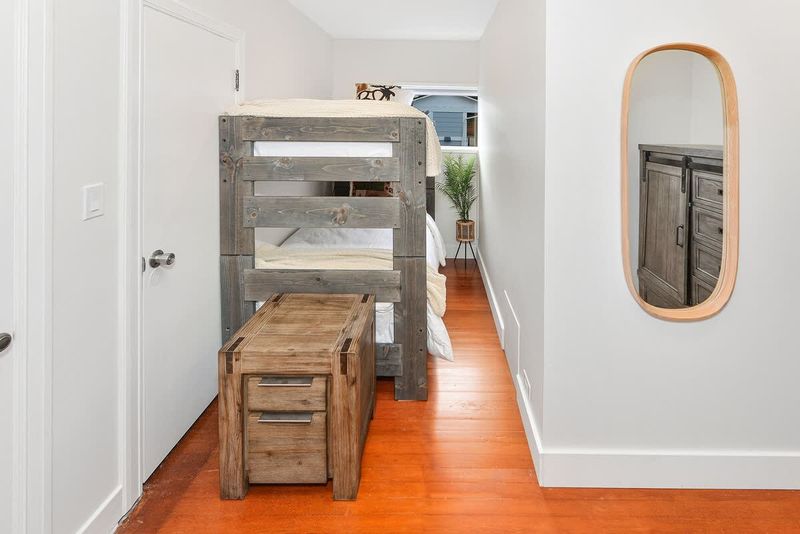 Third bedroom with single bunks.