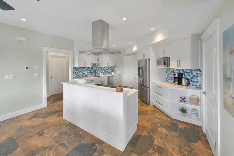 Second full kitchen on the lower floor.