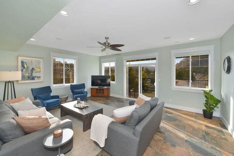 Well appointed family room on the lower floor with amazing views.